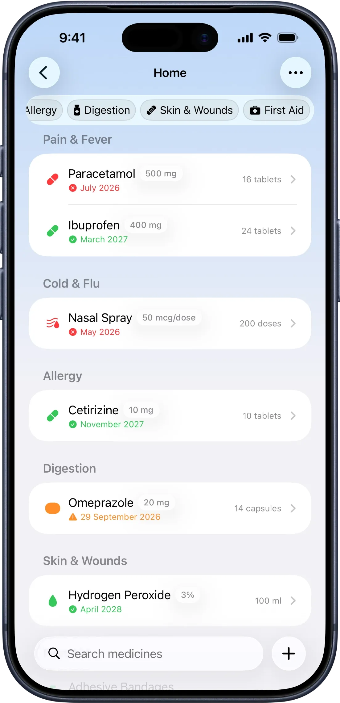 iPhone Home kit list grouped by category, each medicine showing a dosage badge next to its name — Paracetamol 500 mg, Ibuprofen 400 mg, Nasal Spray 50 mcg/dose, Cetirizine 10 mg, Omeprazole 20 mg, Hydrogen Peroxide 3%